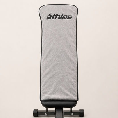 Áthlos One™ — Housse de banc de musculation avec poche téléphone